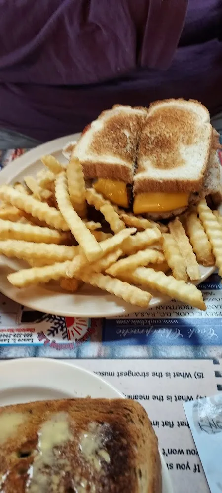 Bacon Egg and Cheese Sandwich on Toast with Fries